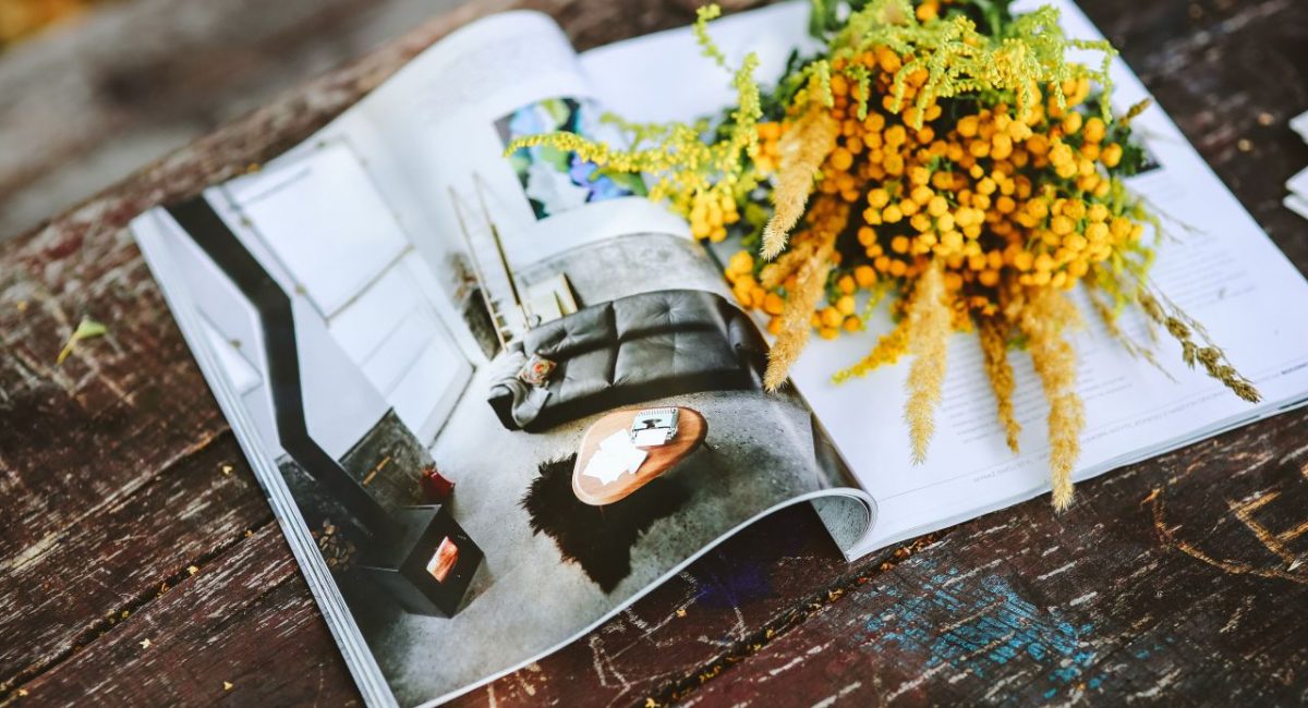 kaboompics_Yellow flowers on a magazine